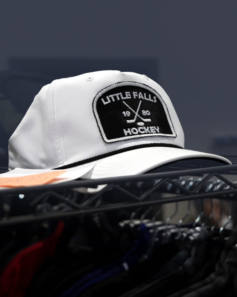 Custom Little Falls Hockey patch hat designed by White Wolf MN featuring a premium embroidered patch on a white rope cap in Central Minnesota.