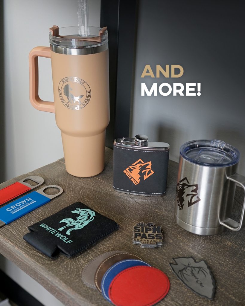 Custom promotional merchandise and branded drinkware displayed by White Wolf MN in Central Minnesota including tumblers, koozies, patches, and promotional products.